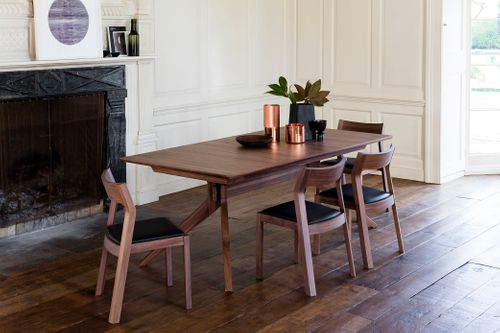 Cross Extending Table and Profile Chairs